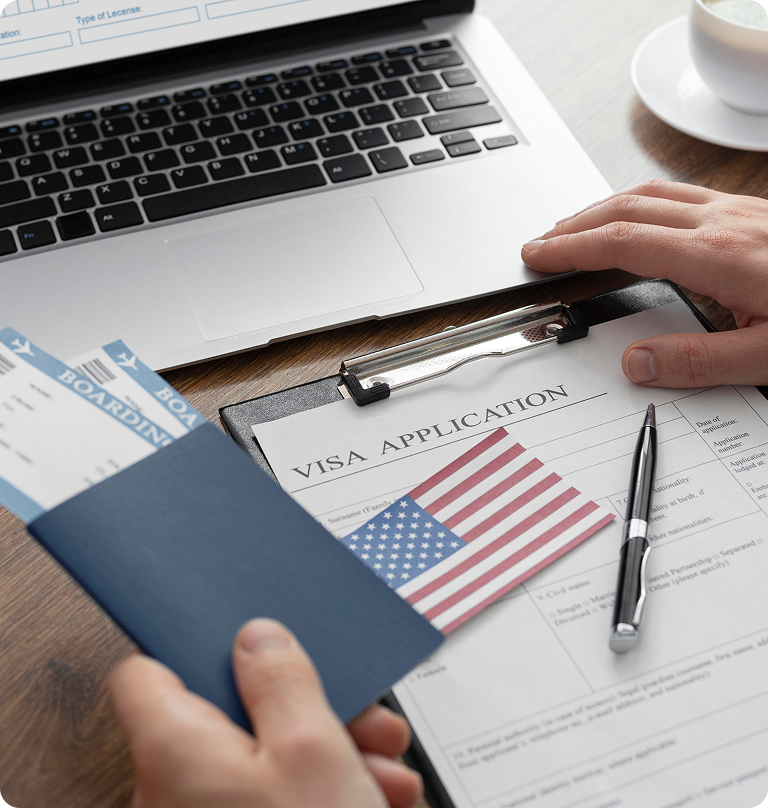 Passport and U.S. visa application form on a desk representing visa processing, immigration services, and travel document assistance.