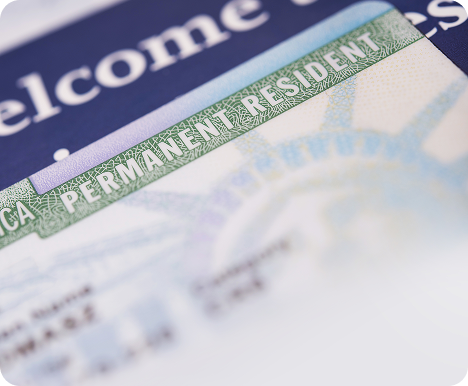 Close-up of a U.S. Permanent Resident Card representing Green Card approval, lawful permanent residency, and immigration services.