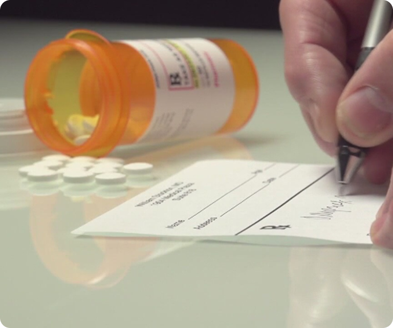 Prescription medication and legal documents related to immigration medical waiver and visa application requirements