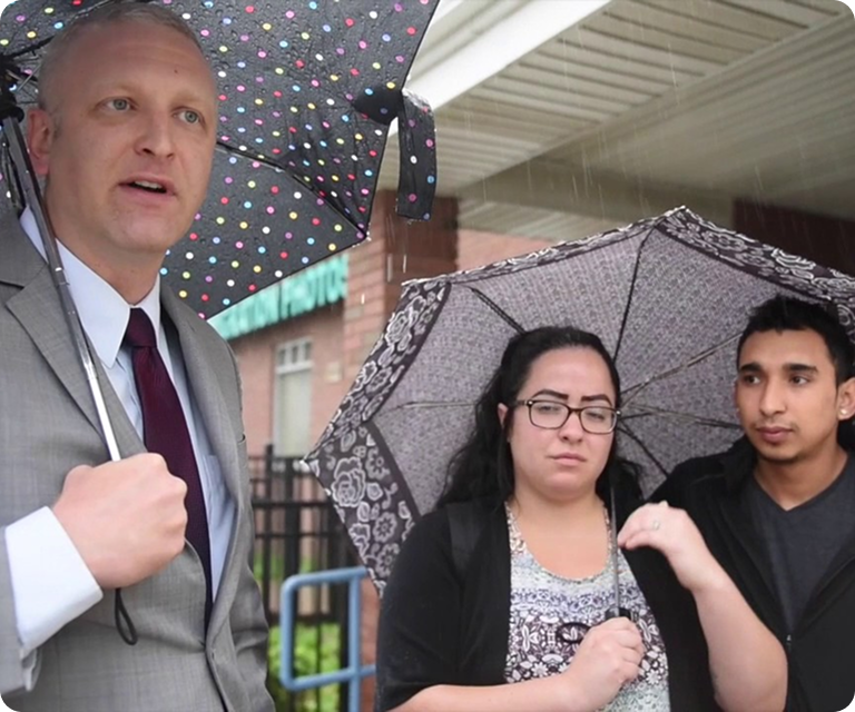 Immigration attorney providing legal guidance and support to immigrant families during a consultation
