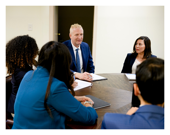 Immigration lawyers team in meeting